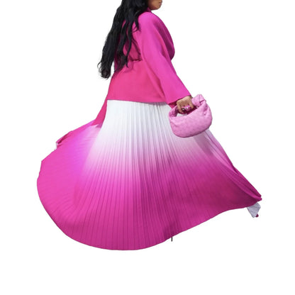 Stylish autumn/winter ensemble for women by CM.YAYA, featuring a floor-length skirt and beautiful print that exemplifies luxury and comfort.