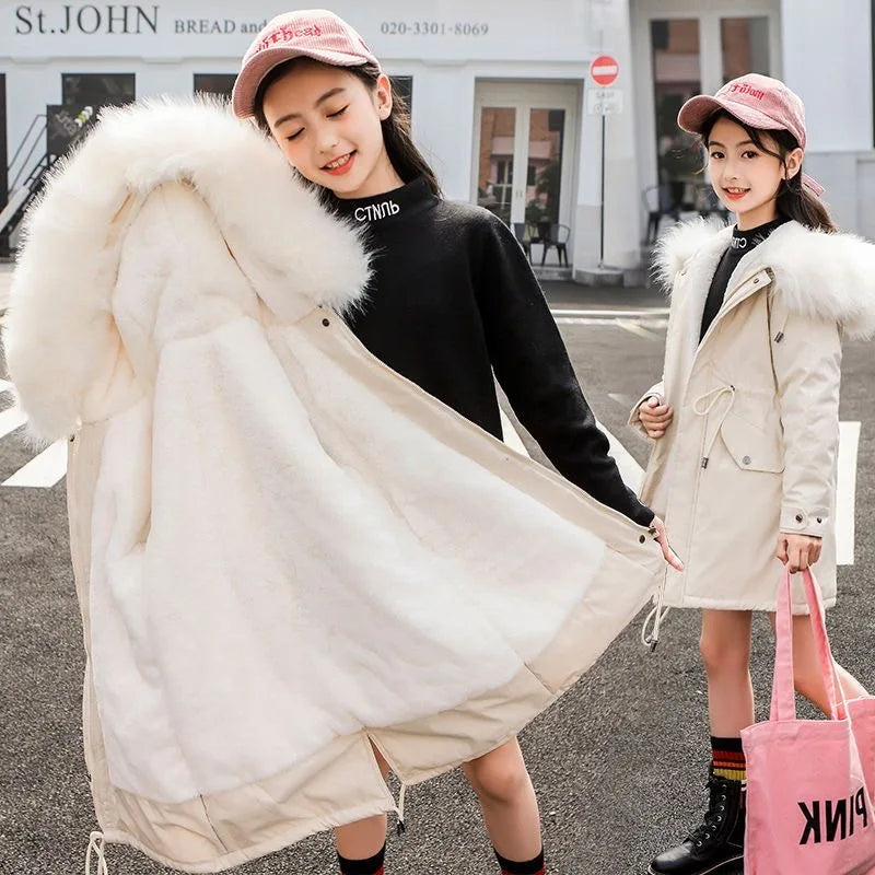 Chic hooded puffer jacket for girls aged 5-14, adorned with a luxurious fur collar, offering warmth and style during the cold seasons.