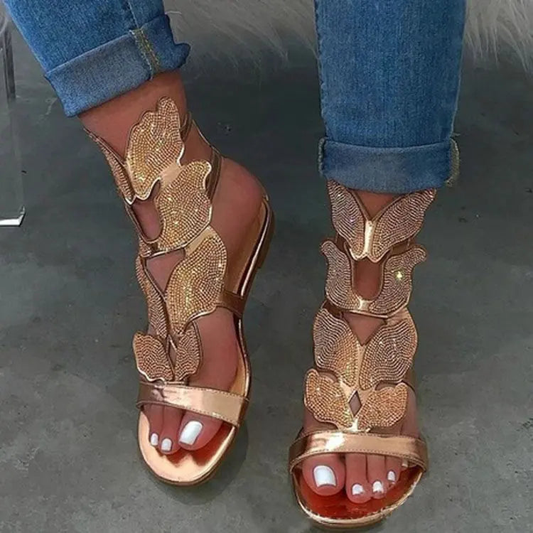 Women's plus size gladiator sandals featuring exquisite crystal butterfly detail, perfect for adding a touch of luxury to your casual summer outfit.
