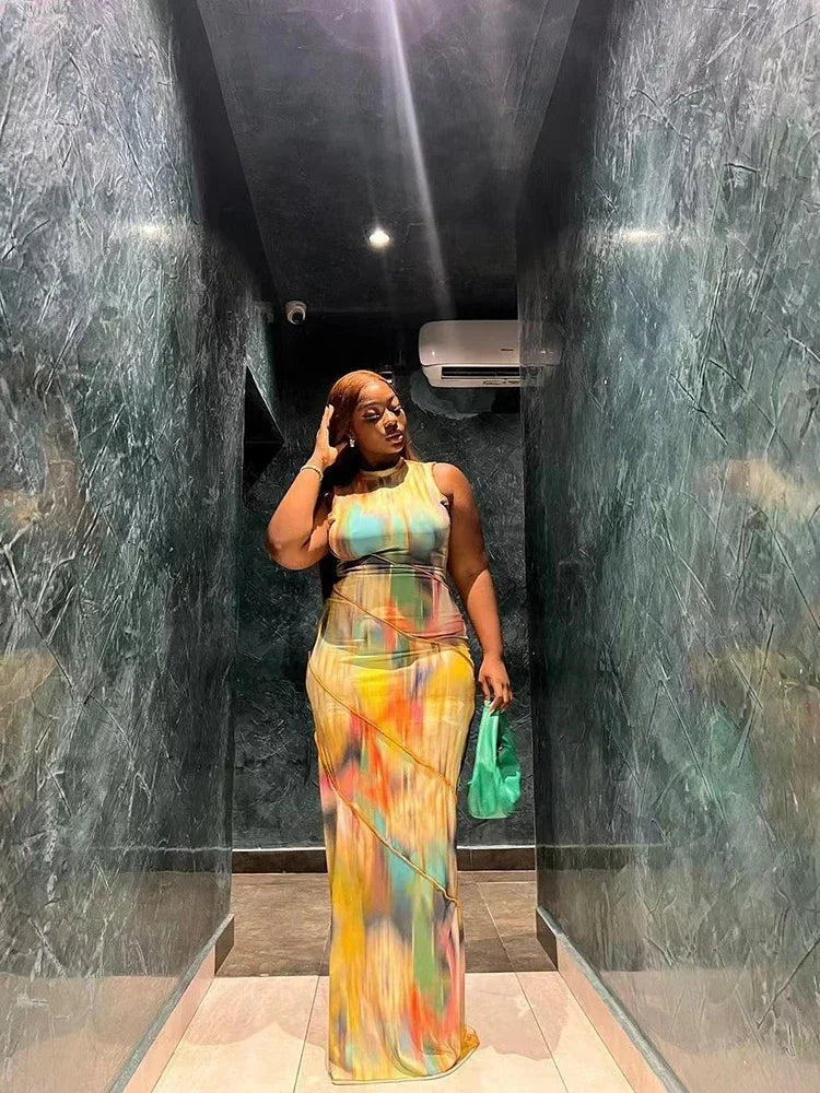 Stylish sleeveless BWQ Maxi Dress showcasing a bold tie-dye design, crafted from luxurious fabric for a chic and fashionable look.