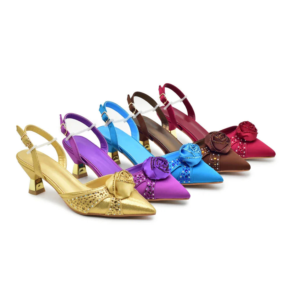 Stylish matching handbag designed to complement the elegant women's Italian shoe set, adorned with artistic floral details.