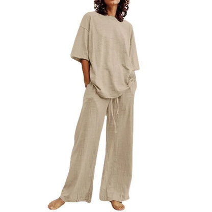Chic and contemporary women's casual set with a delicate lace-up O-neck design and versatile wide leg pants, embodying luxury summer fashion.