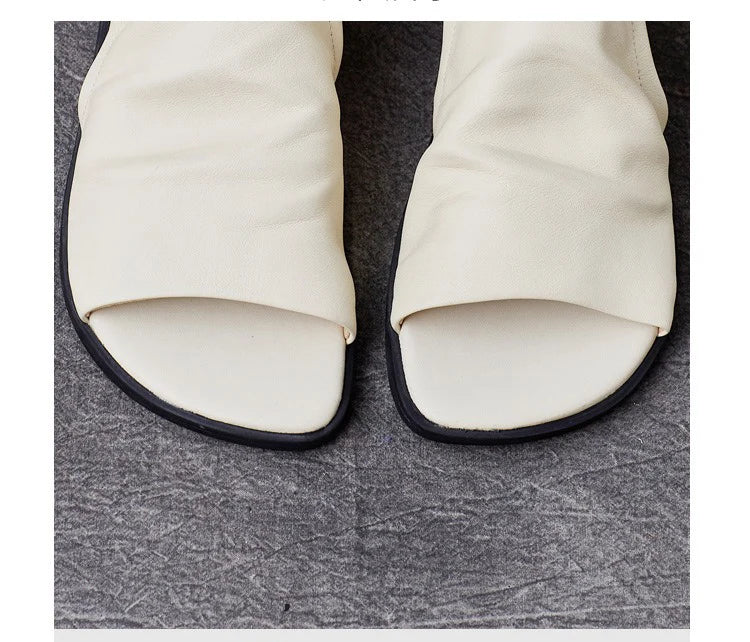 Luxury flat sandals for women, crafted from genuine leather with hook and loop closure, ideal for comfort and style.