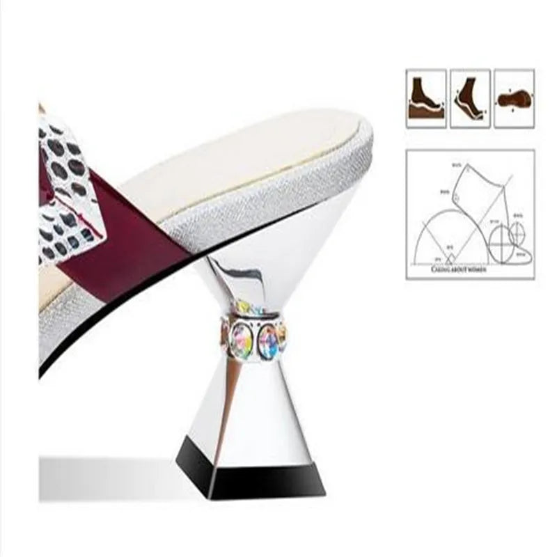 Luxurious pointed designer slides adorned with shimmering rhinestones, perfect for elegant occasions and parties.