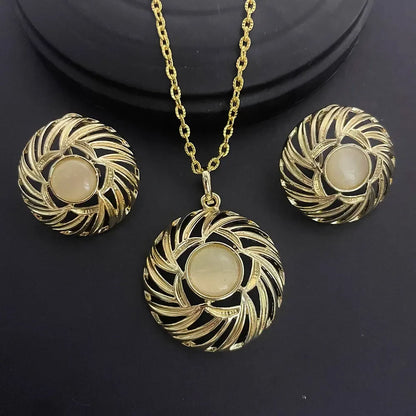 Luxury 24K gold-plated women's jewelry set including a statement necklace and matching earrings, perfect for special occasions.