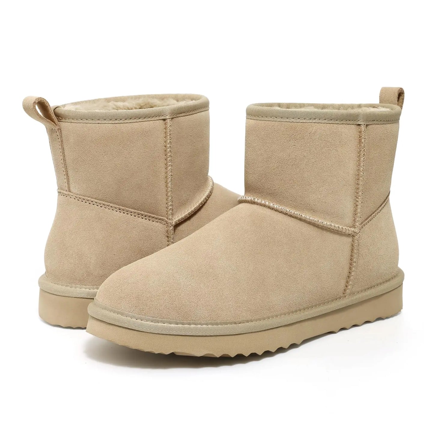 Luxurious winter footwear, women’s ankle snow boots featuring soft plush interiors for ultimate comfort.