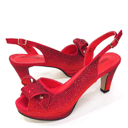 Close-up detail of the luxurious rhinestone embellishments on Venus Chan's high heels, showcasing the exquisite craftsmanship and elegant style.