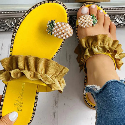 Chic outdoor setting featuring Women's Pineapple Pearl Flat Toe Sandals, capturing the essence of summer style and casual elegance for modern women.