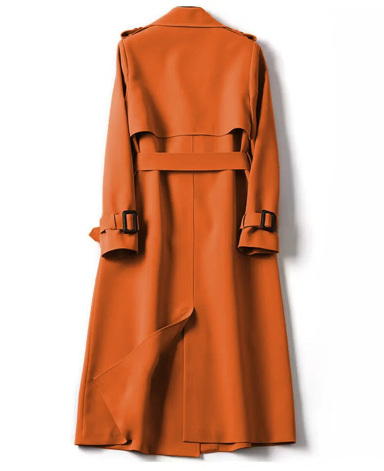Elegant long trench coat with pockets, perfect for layering in cooler weather, showcasing a versatile style suitable for both professional and casual settings.