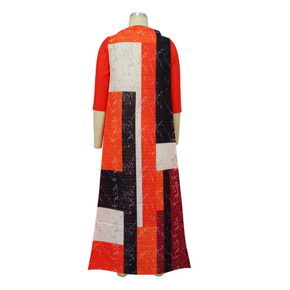 Full-length view of the elegant African dress on a model, demonstrating the flattering pleated design ideal for special occasions and casual wear alike.