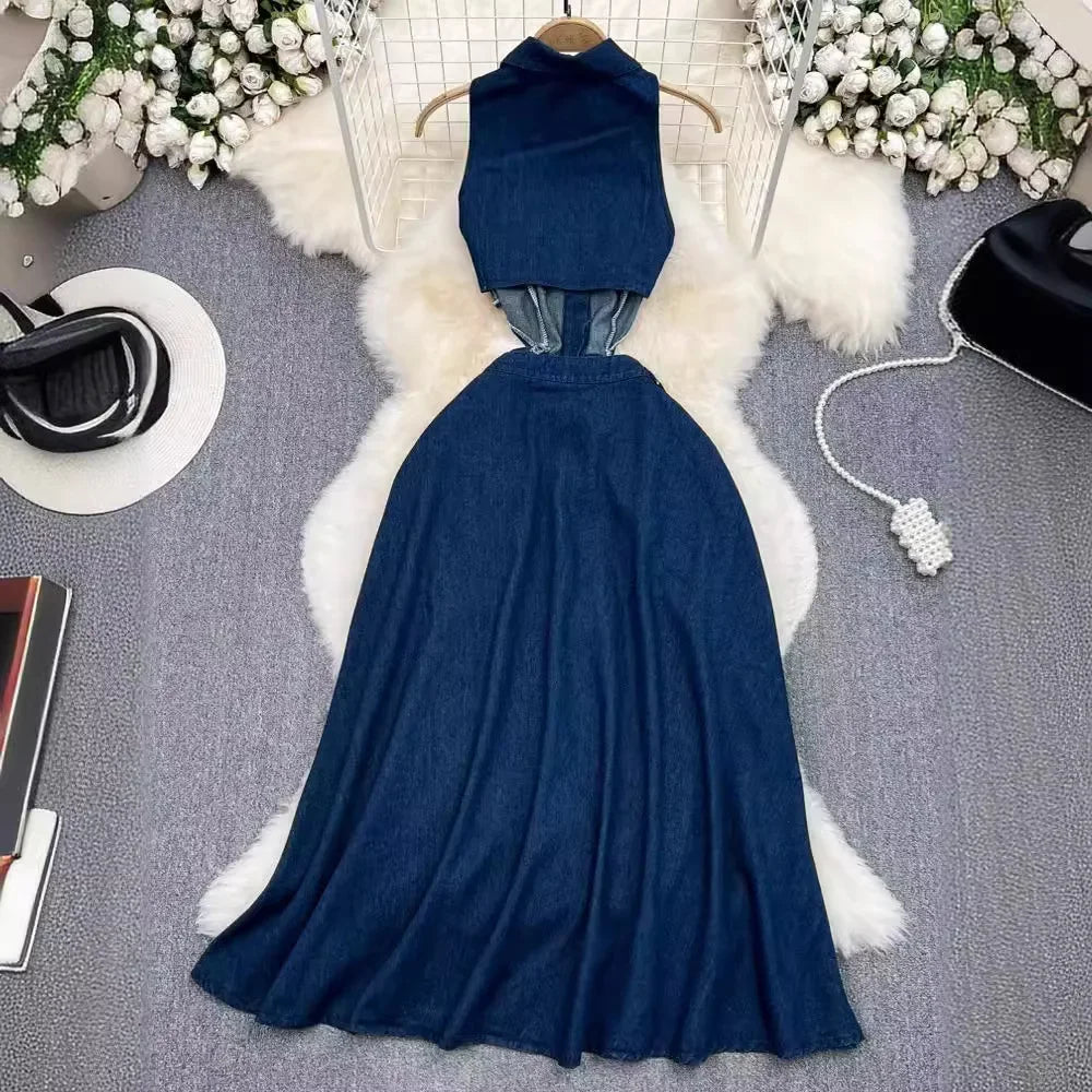 Stunning women's sleeveless denim dress styled with a turn-down collar and high waist, illustrated in a serene setting, epitomising elegance and sophistication for the modern woman.