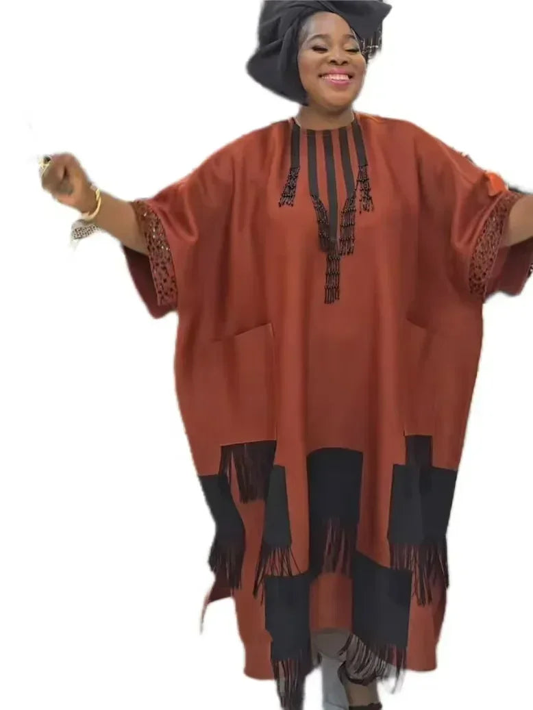 Versatile polyester dashiki dress in orange-red and apricot hues, designed for comfort and style, suitable for all body types.