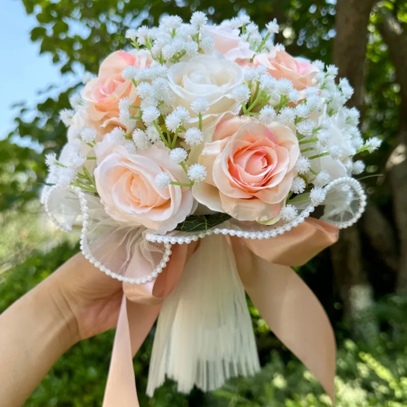 Luxurious silk wedding bouquet adorned with babysbreath roses and elegant pearl lace, designed for brides and bridesmaids.