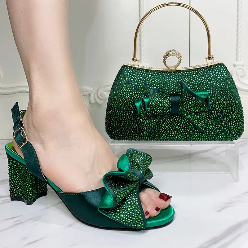 Exquisite women's high heels with a glamorous ankle strap design, elegantly paired with a matching handbag, perfect for sophisticated occasions.