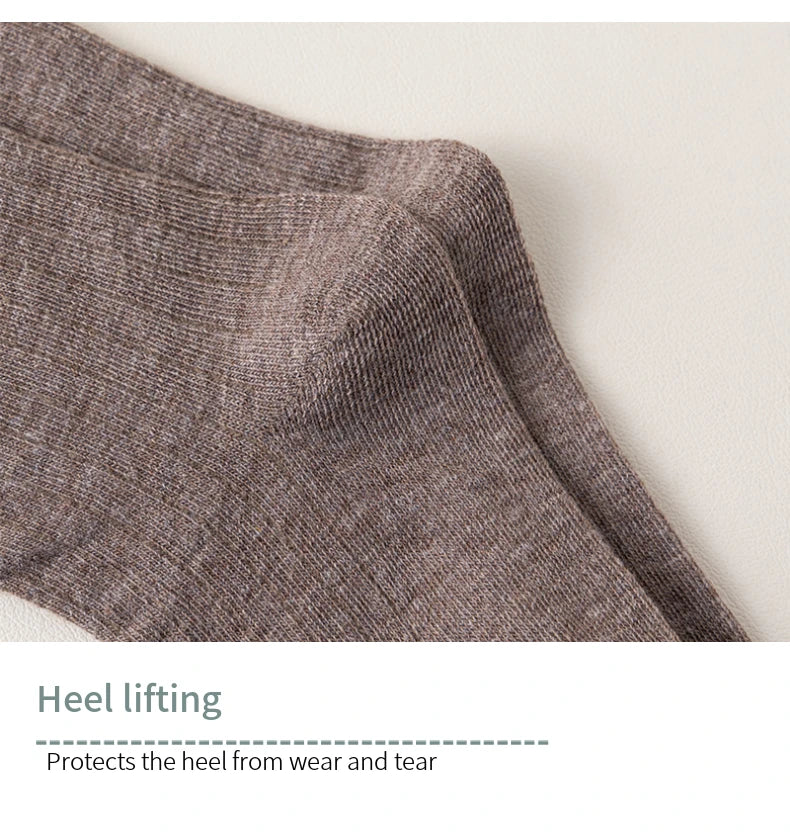 Premium casual men's socks, crafted from an exquisite fabric blend, ensuring warmth and sophistication during winter activities.