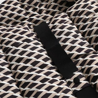 Chic winter jacket for women, showcasing a stylish hood and a refined slim fit, expertly designed for warmth and comfort.