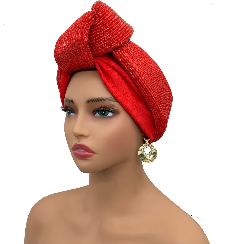 Sophisticated women's turban headwrap, elegantly adorned, representing the perfect blend of elegance and versatility for contemporary fashion.