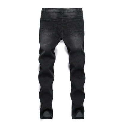 Full-length view of luxury ripped skinny jeans in premium denim, exemplifying contemporary style for men.