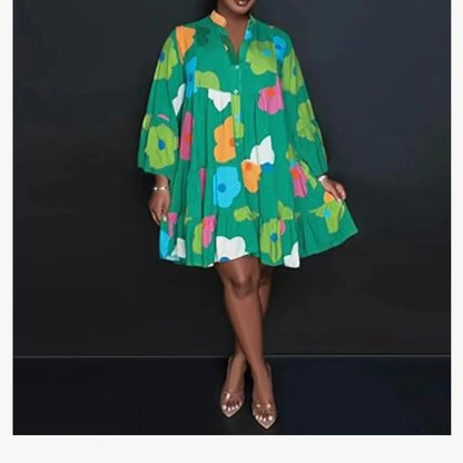 Sophisticated knee-length long sleeve jumpsuit with swing design in a luxurious fabric, ideal for autumn outings.