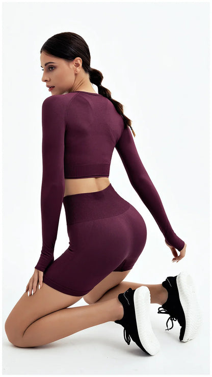 Premium WAREBALL seamless yoga set for women, featuring full-sleeved and sleeveless options in classic black, designed for elegant exercise sessions.