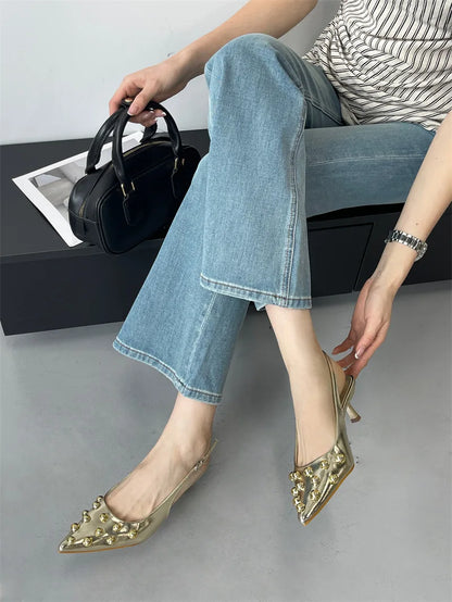 Elegant fashion high heeled sandals for women featuring rivet design and pointed toe, perfect for summer occasions.