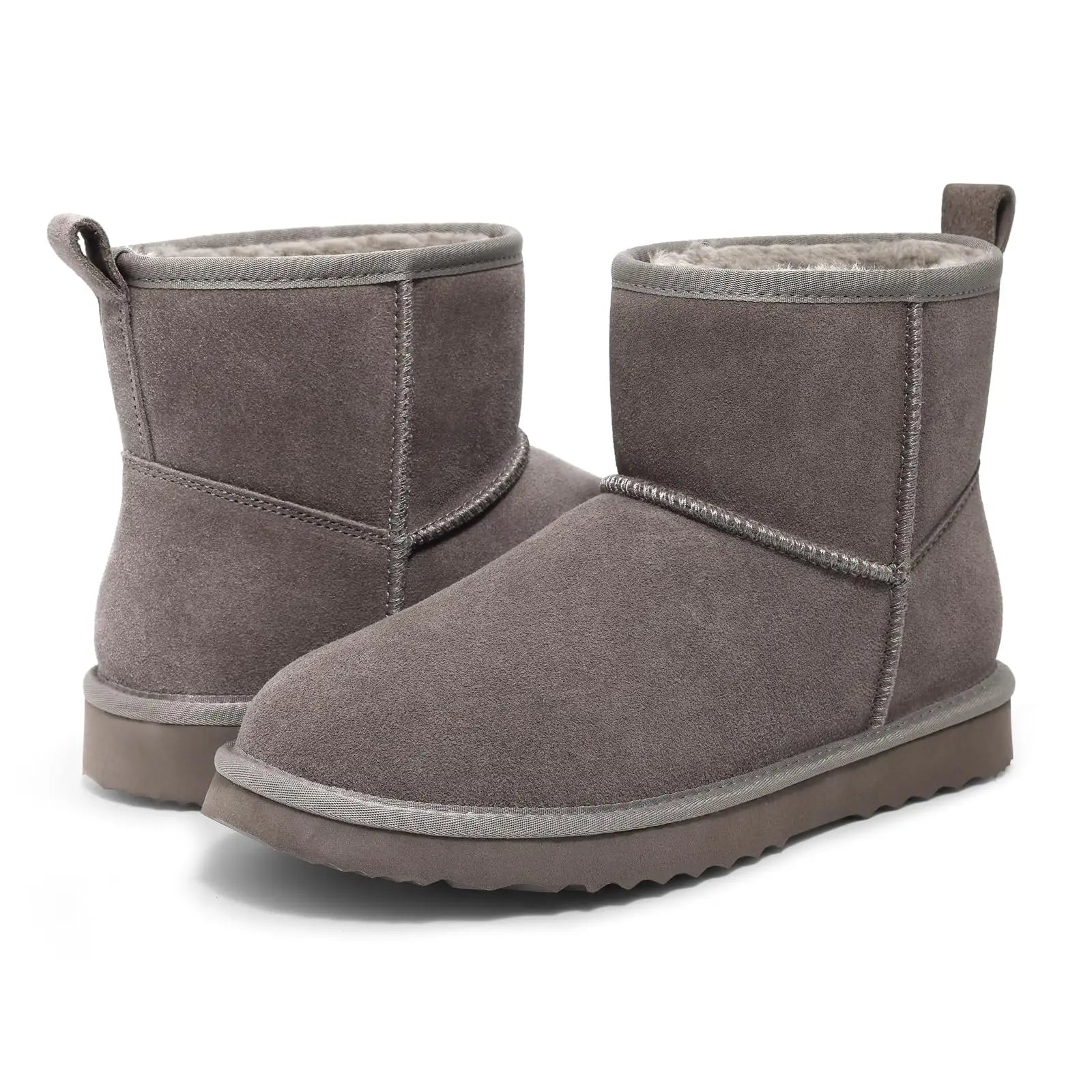 Elegant women's plush suede ankle snow boots, featuring a stylish slip-on design ideal for winter outings.