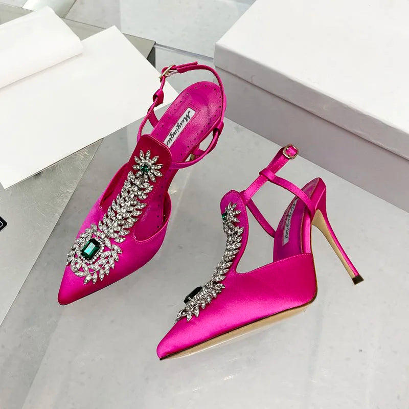 Elegant ladies satin wedding shoes featuring rhinestones, pointed toe, and high stiletto heels, ideal for a fairy-tale bridal look.