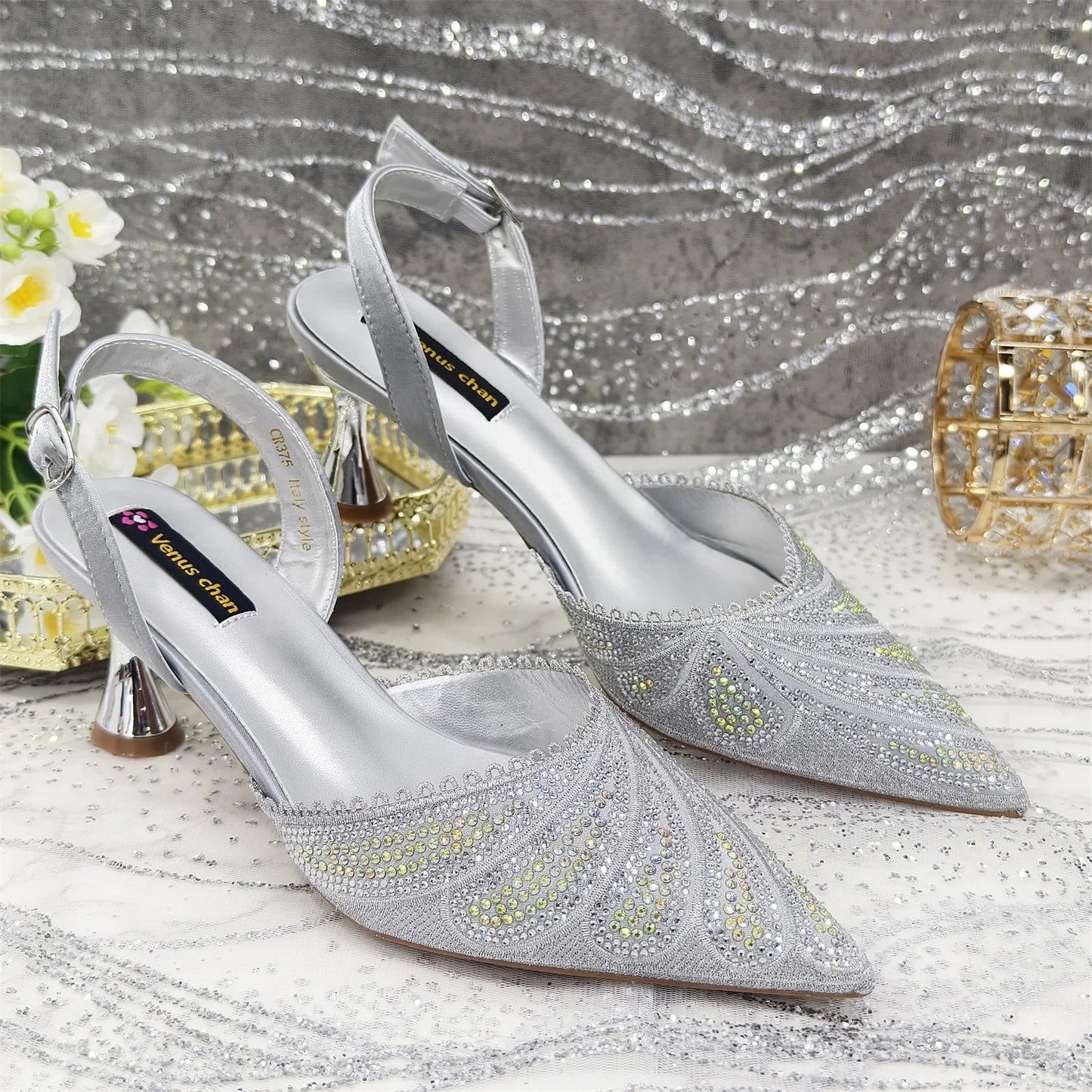 Fashionable women's high heels and bag set, perfect for parties, featuring spike heels and elegant detailing in mixed colours.