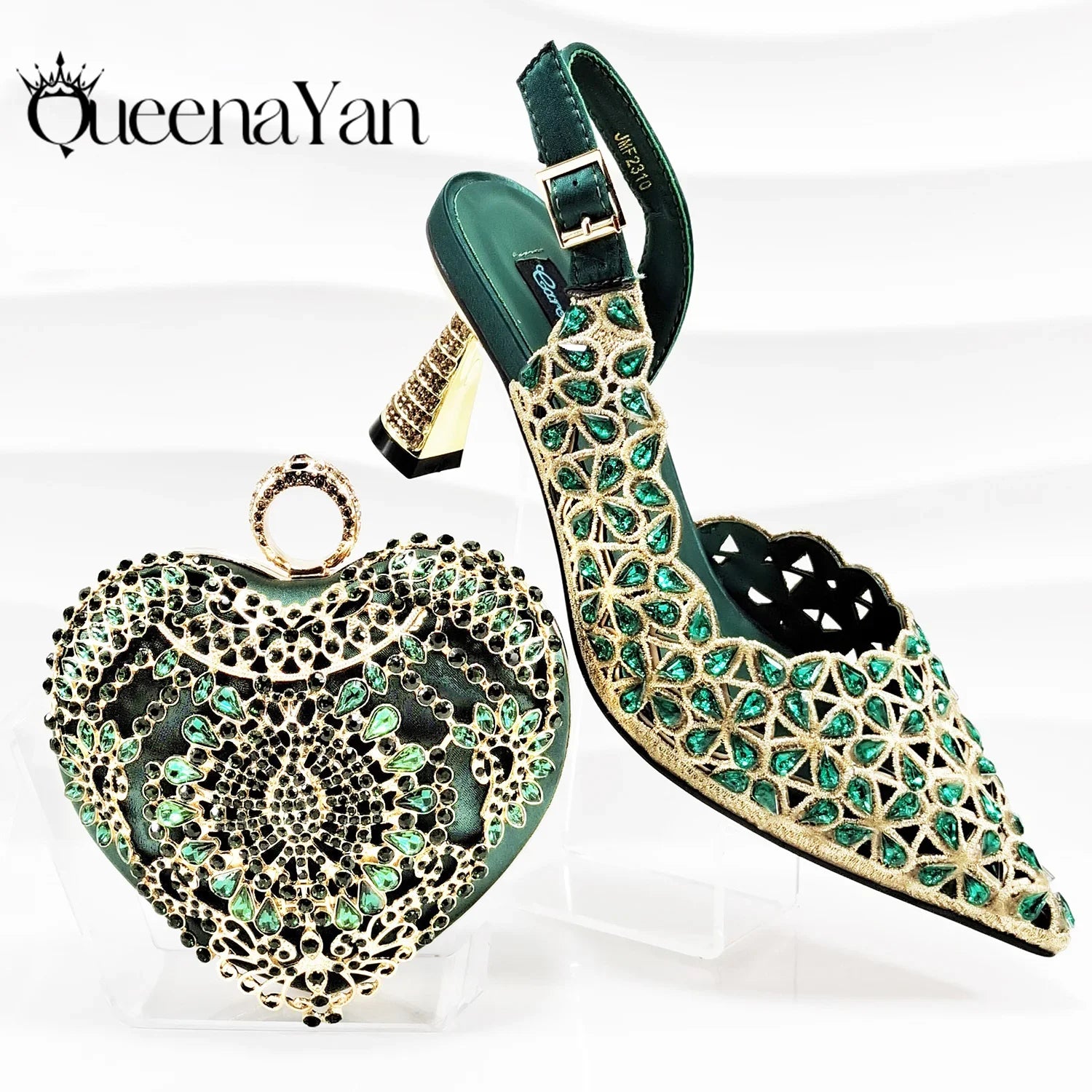 Luxurious presentation of QSGFC fuchsia women's heel pumps and matching handbag, showcasing modern Italian design and superior materials.