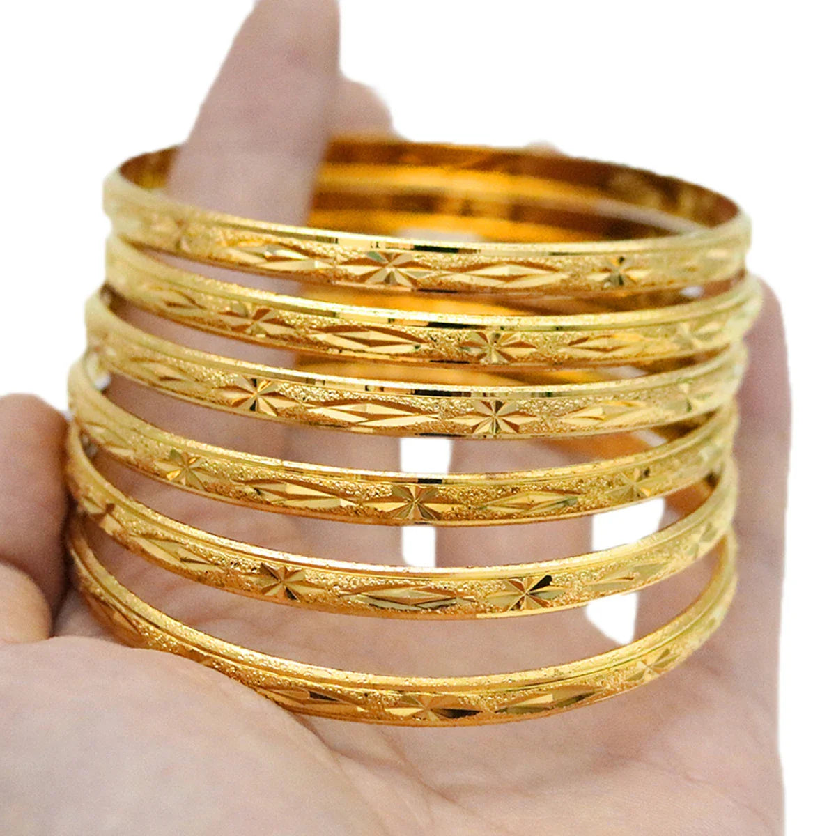 Chic gold bangle design showcasing the luxurious appeal and detailed work, making it an enchanting addition to any jewellery collection.