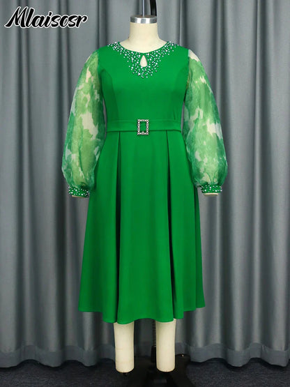 Sophisticated mid-calf Mlaiscsr dress in green, showcasing intricate embroidered flares and full lantern sleeves, ideal for professional settings and elegant gatherings.