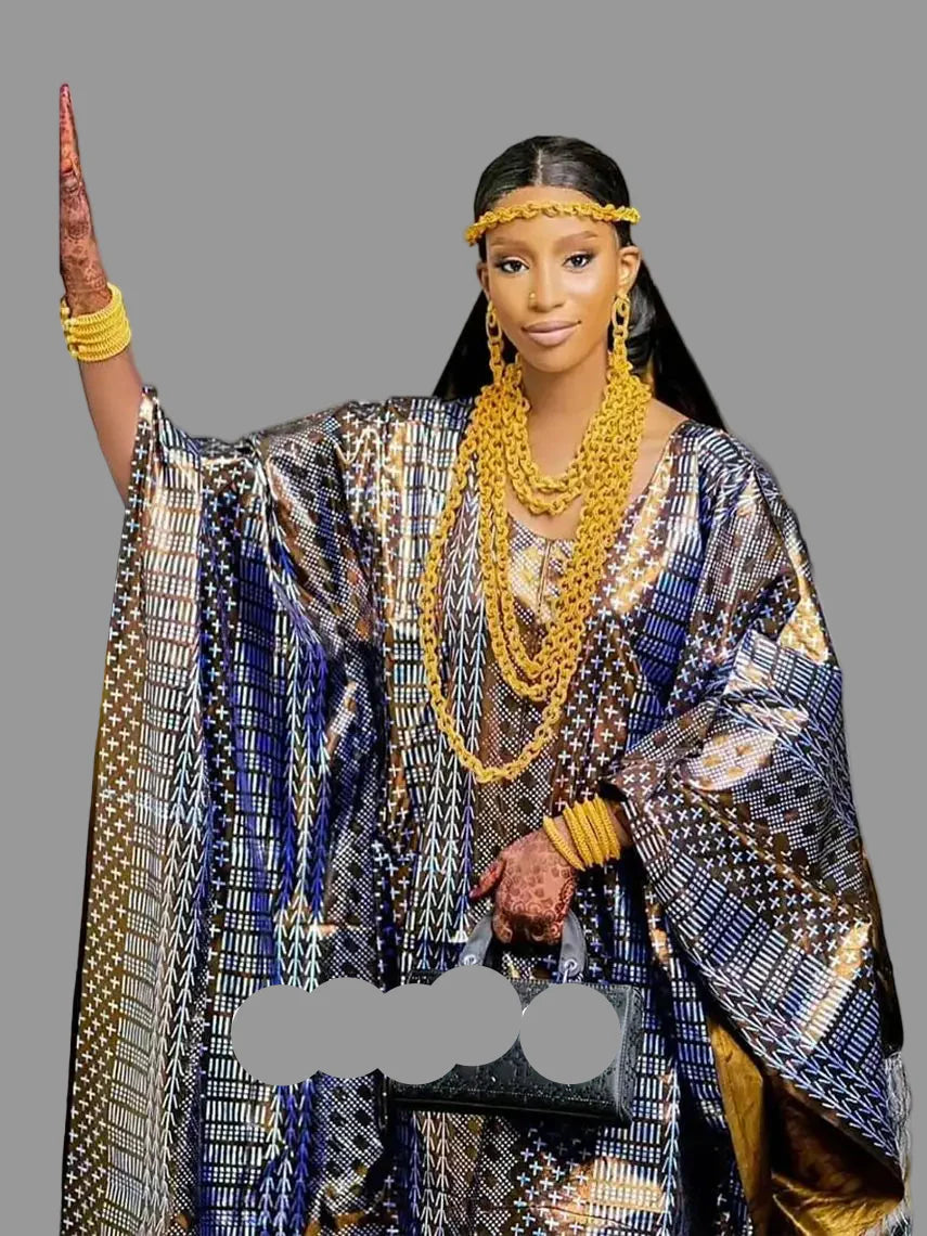 Stylish women’s African dashiki gown with stunning lace embroidery and embellishments, designed for weddings and formal events.