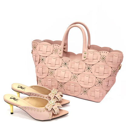 Stylish women's outfit featuring elegant high-heeled shoes and matching bag set, embodying luxury and modern fashion for the discerning woman.