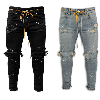 Elegant full length trousers for men, ideal for clubbing and parties, showcasing a trendy distressed aesthetic.