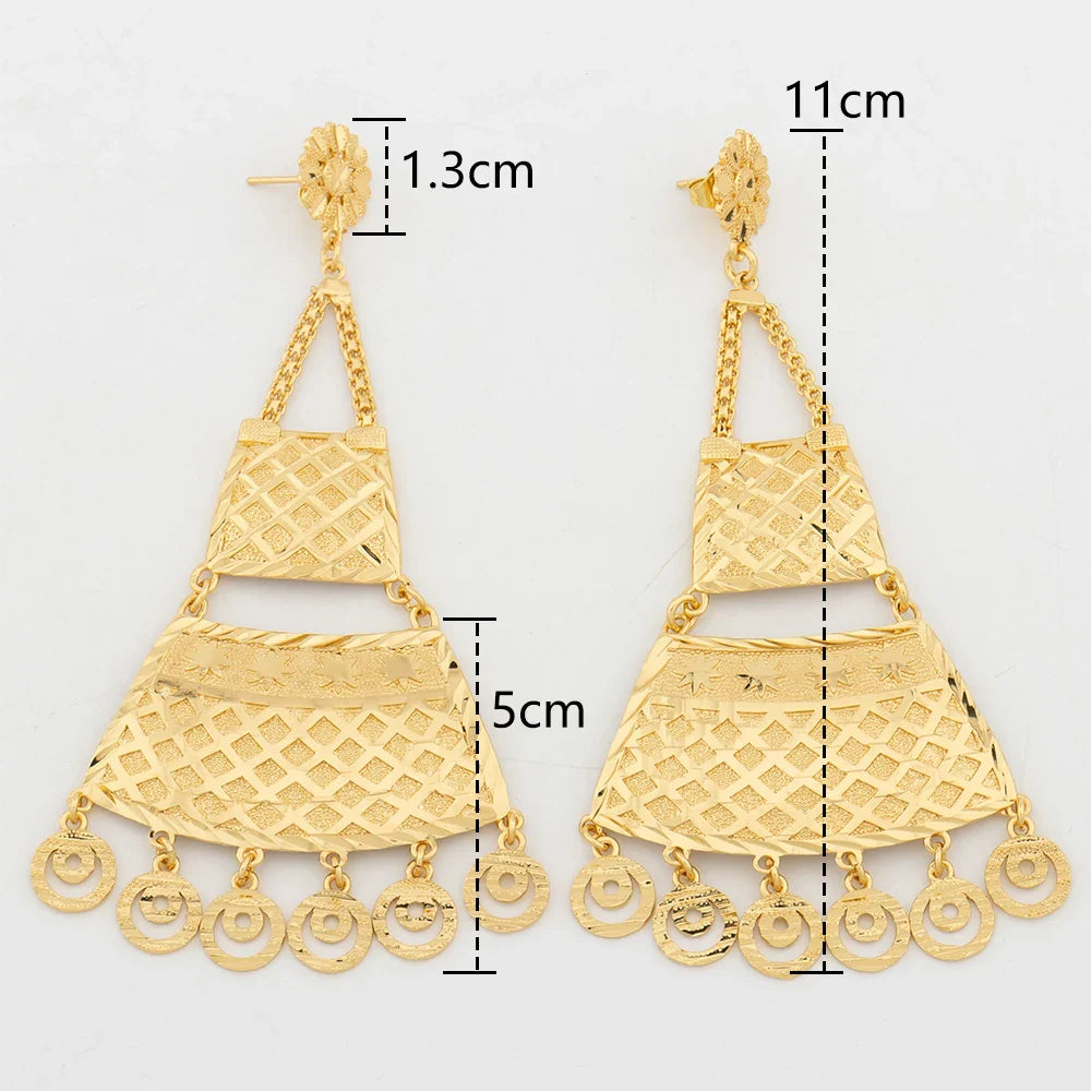 Sophisticated drop earrings with big copper tassel, designed in elegant geometric shapes, suitable for both formal and casual wear.