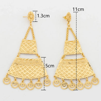 Sophisticated drop earrings with big copper tassel, designed in elegant geometric shapes, suitable for both formal and casual wear.