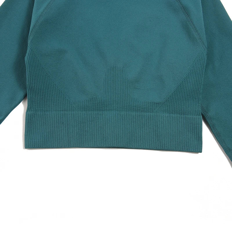 Chic WAREBALL Seamless Yoga Set displayed in soft pink, showcasing the perfect blend of comfort and style for upscale women’s fitness apparel.