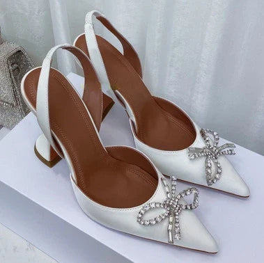 Elegant luxury women's rhinestone bow stiletto heels sandals showcasing pointed toe design with super high 8cm thin heels, perfect for sophisticated party occasions.