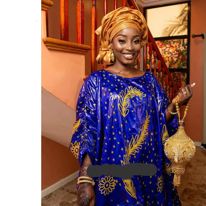 Luxury African Dashiki Bubu Dress in Rich Blue Cotton adorned with delicate Embroidery Lace, showcasing elegance and cultural heritage.