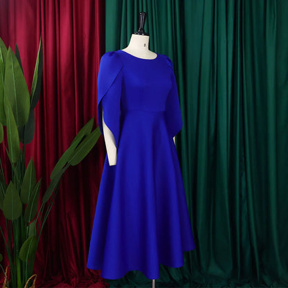 Model wearing an elegant luxury pleated dress, displaying the versatility of the outfit for all seasons with a trendy high-waisted fit.