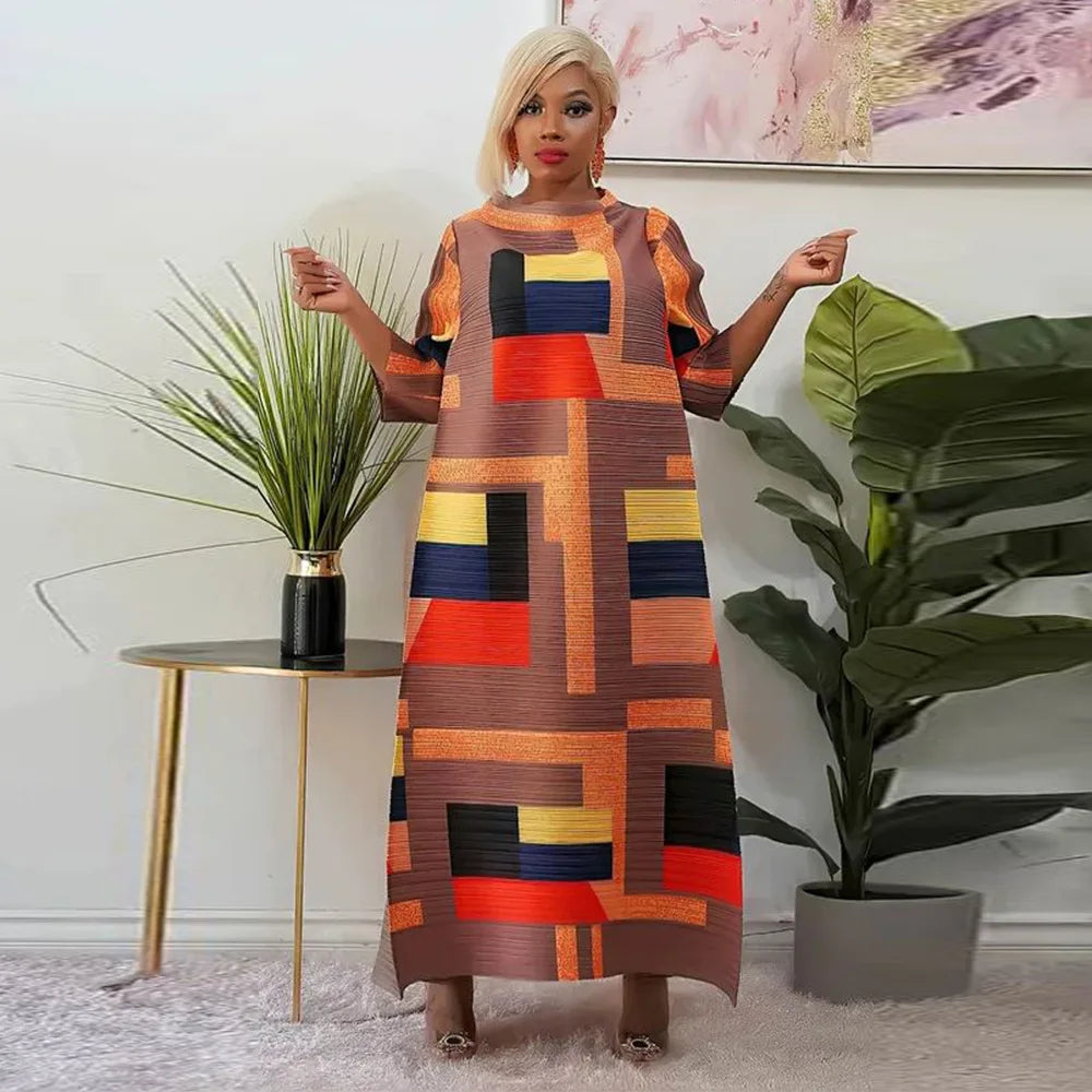 Chic African Plus Size Long Dress in elegant black fabric, showcasing exquisite pleats and a stylish O-neck.