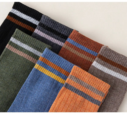 Sophisticated men's winter sports socks collection, five pairs constructed with soft cotton and spandex, providing an exquisite fit and exceptional insulation for cold weather.