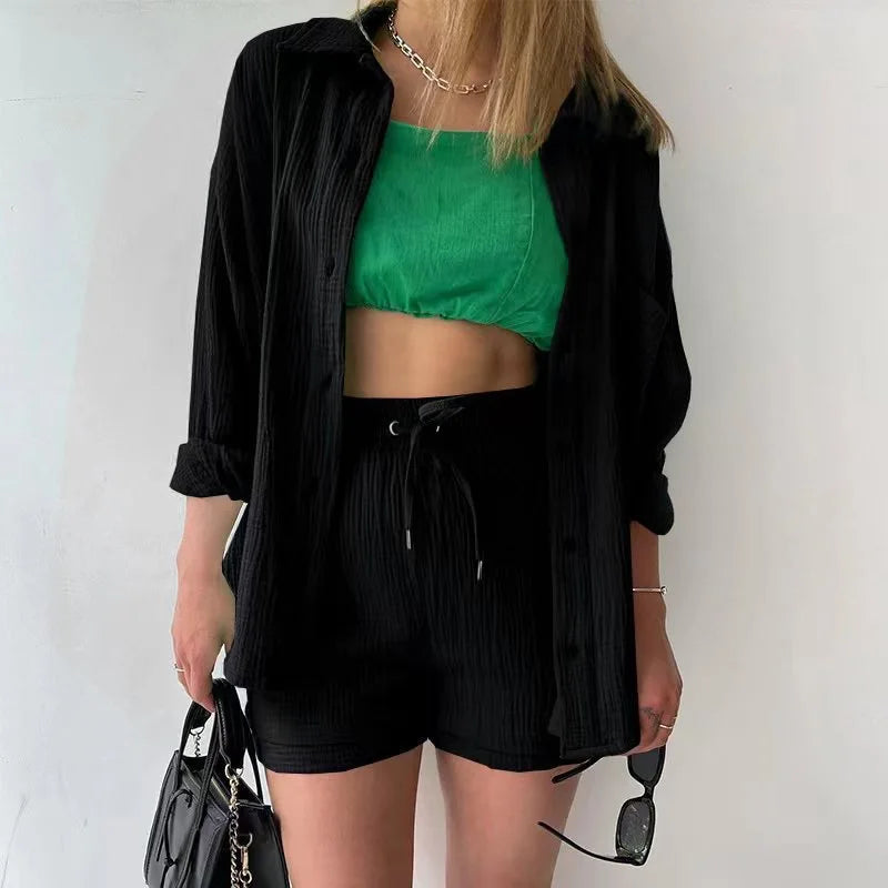 Elegant women's luxury grass green 2-piece set featuring a loose cardigan blouse and drawstring wide leg shorts, perfect for summer fashion.