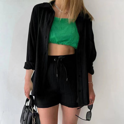 Elegant women's luxury grass green 2-piece set featuring a loose cardigan blouse and drawstring wide leg shorts, perfect for summer fashion.