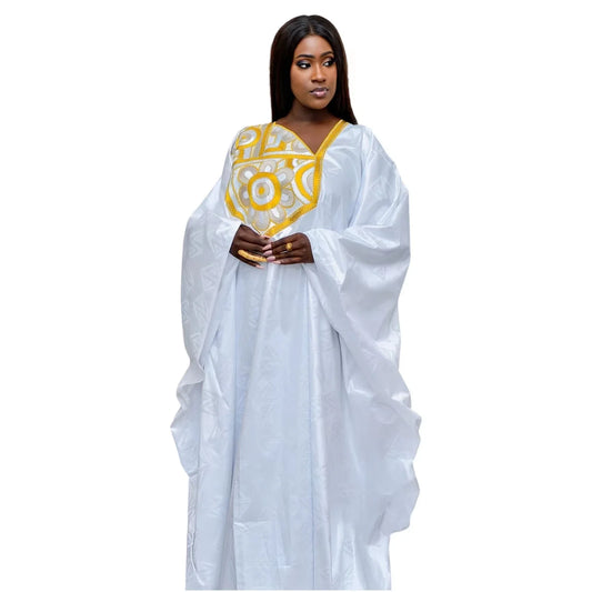 Exquisite plus size African Dashiki dress for women, featuring luxurious Bazin Riche embroidery, perfect for elegant party attire.