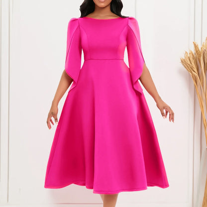 Close-up view of the luxurious fabric and intricate details of an elegant women's ankle-length A-Line evening dress with zipper closure.