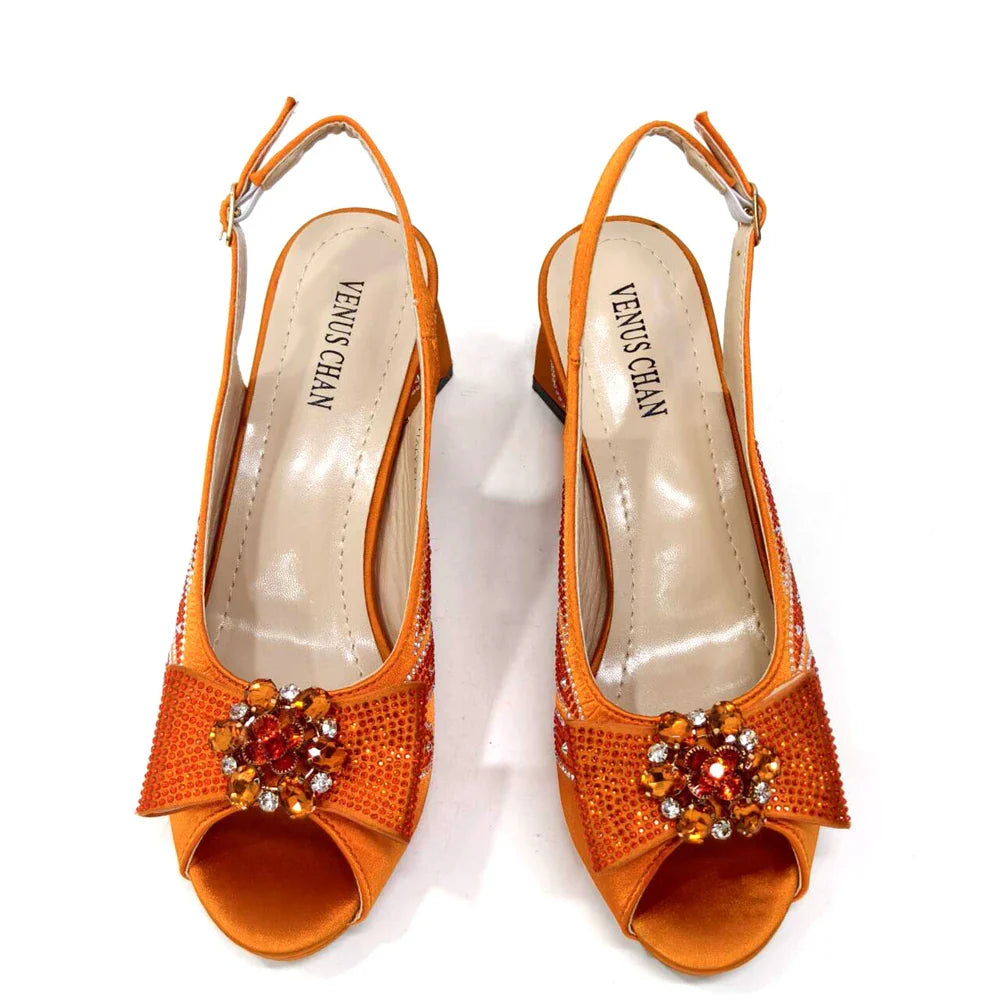 Venus Chan peep toe high heels in purple paired with matching bag, showcasing a fashion-forward ensemble ideal for parties and special events.