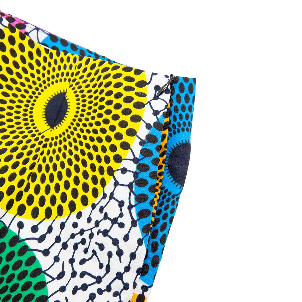 Stunning Ankara wax print midi skirt showcasing vibrant patterns, ideal for elegant women attending weddings and parties.