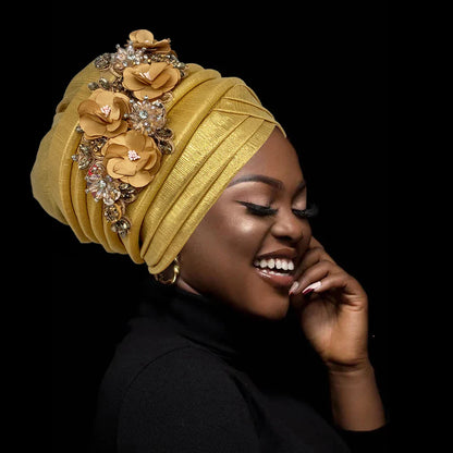 Luxurious African women's turban cap featuring a diamond flower design, elegant auto gele headtie, and sophisticated head wrap, perfect for all occasions.
