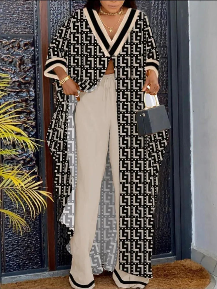 Dynamic, contemporary women's casual ensemble, combining a loose-fitting blouse and versatile wide leg trousers, ideal for both office and leisure.